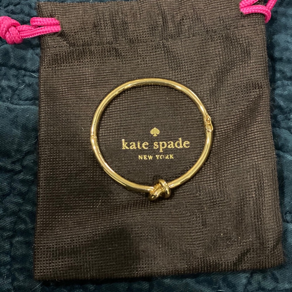 Kate Spade gold knot bracelet.